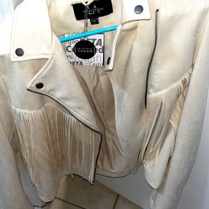 Vegan leather off white jacket with fringe.